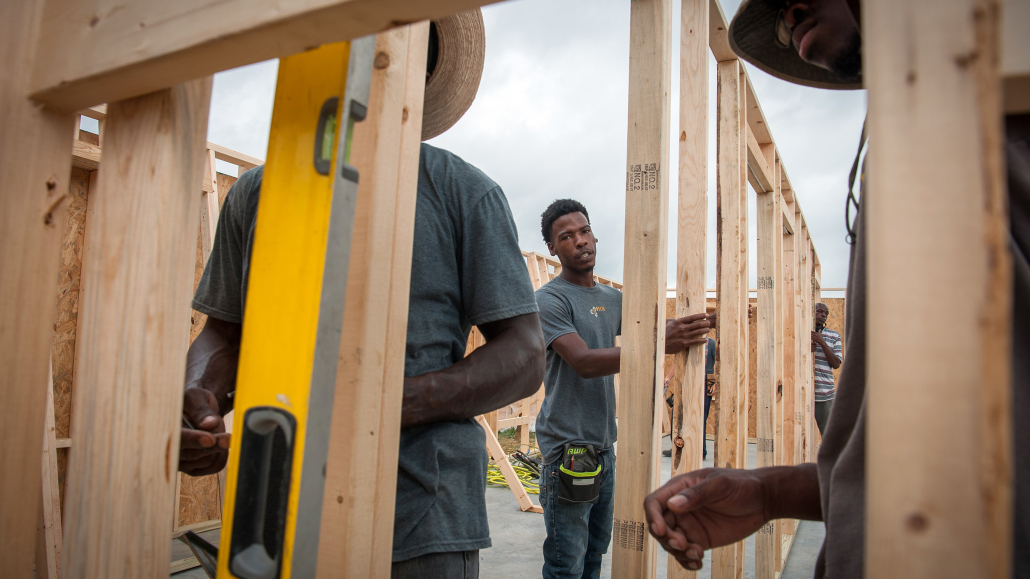 A construction manager frames a house in Eastmoor, Mississippi